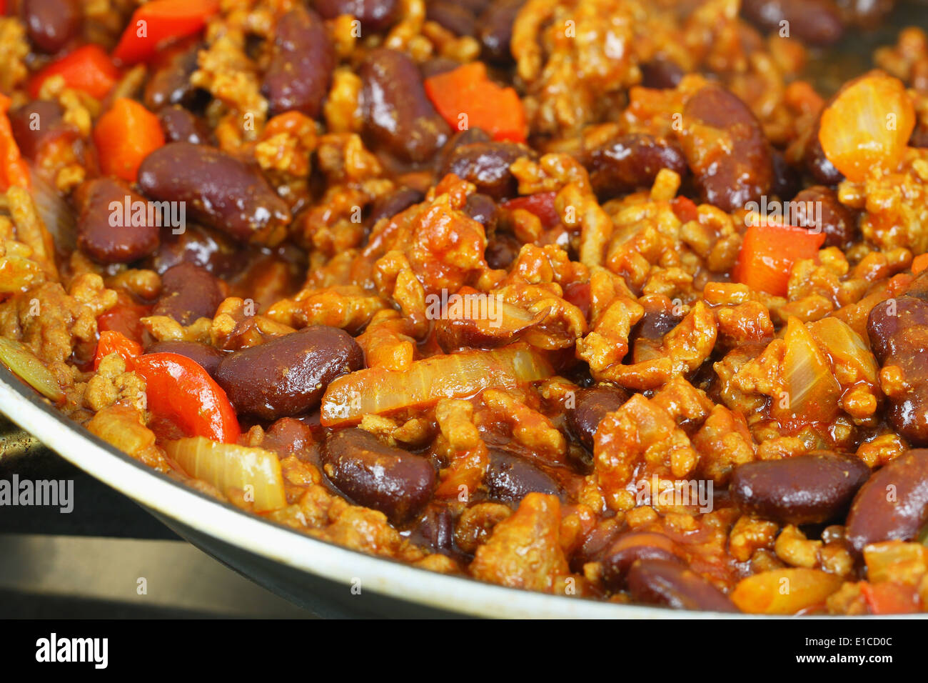 Chili con carne in frying pan, close up Stock Photo