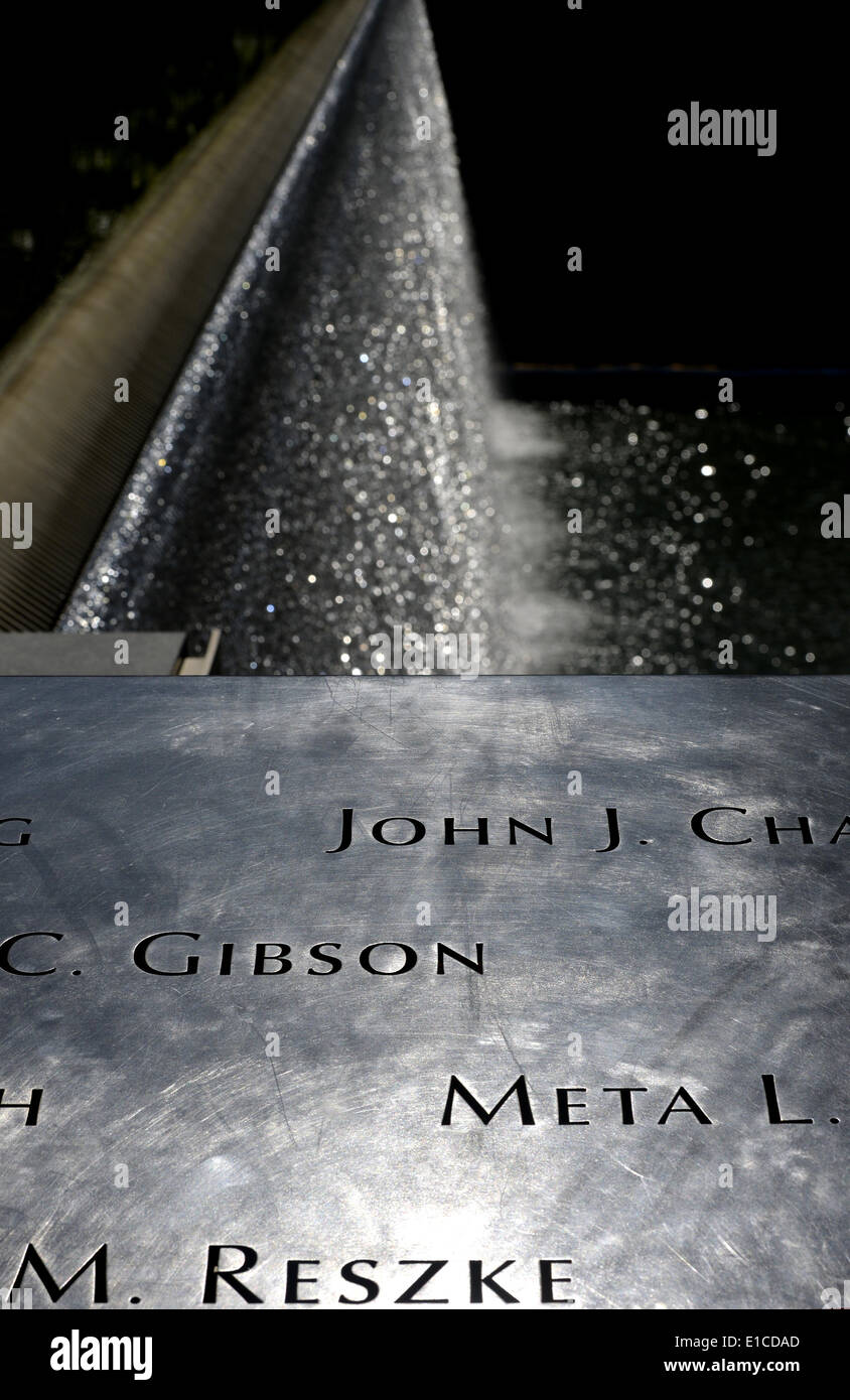New York, USA. 30th May, 2014. The names engraved along the South reflecting pool are seen at the Ground Zero in New York, the United States, May 30, 2014. A wreath laying ceremony was held in honor of the thousands of rescue and recovery workers to mark the 12th anniversary of the official end of the rescue and recovery effort. On May 30, 2002, the Last Column was the final piece of steel to be removed from Ground Zero. Credit:  Wang Lei/Xinhua/Alamy Live News Stock Photo