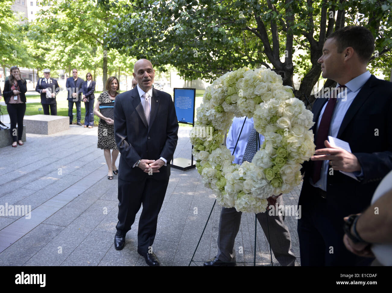 New York, USA. 30th May, 2014. Joe Daniels, president and CEO of the National 9/11 Memorial & Museum, attends the wreath laying ceremony at the Ground Zero in New York, the United States, May 30, 2014. A wreath laying ceremony was held in honor of the thousands of rescue and recovery workers to mark the 12th anniversary of the official end of the rescue and recovery effort. On May 30, 2002, the Last Column was the final piece of steel to be removed from Ground Zero. Credit:  Wang Lei/Xinhua/Alamy Live News Stock Photo