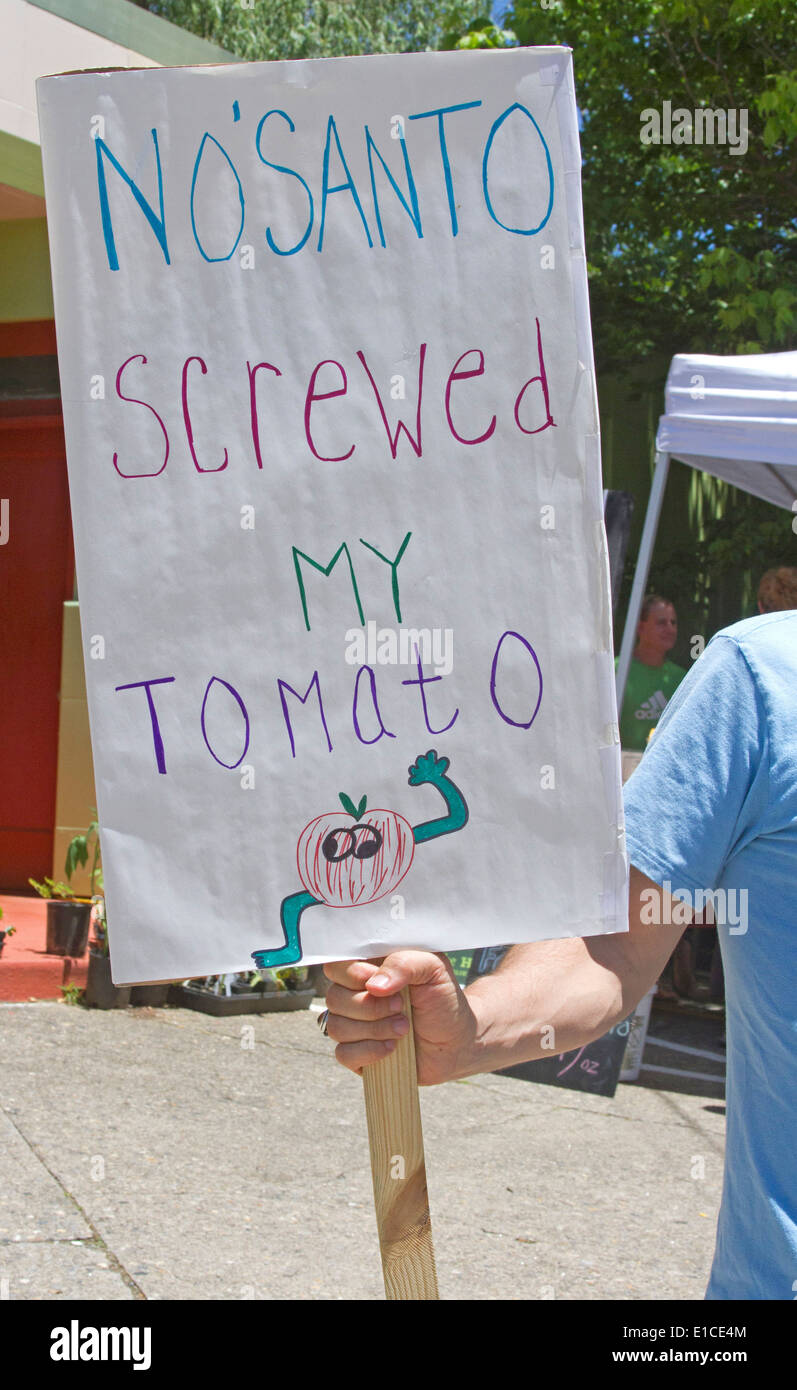 Protester holds an anti Monsanto sign a GMO protest rally on May 24, 2014 in downtown Asheville, NC Stock Photo