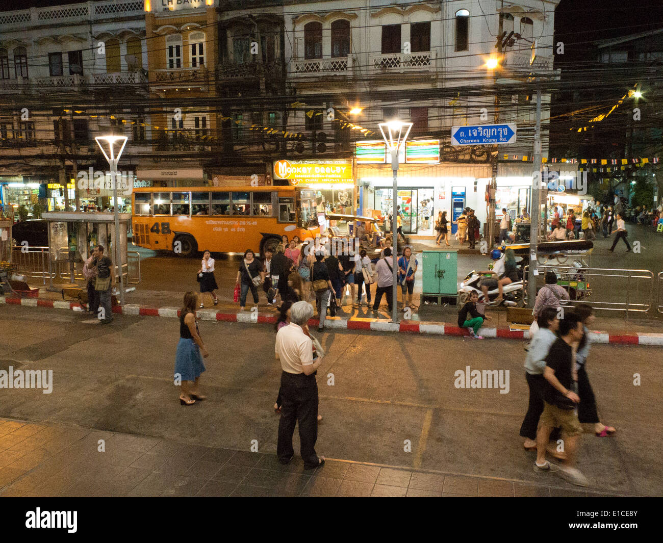 Night shoppers on Charoen Krung Road central Bangkok Thailand Stock Photo