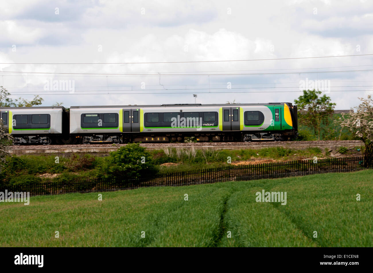 London Midland electric train on West Coast Main Line near Long Buckby