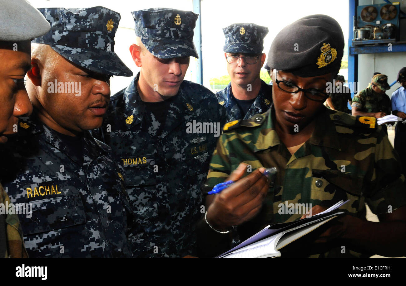 Jamaica Defense Force Coast Guard National Reserve Sub Lt. Althia White completes paperwork to participate in a subject matter Stock Photo