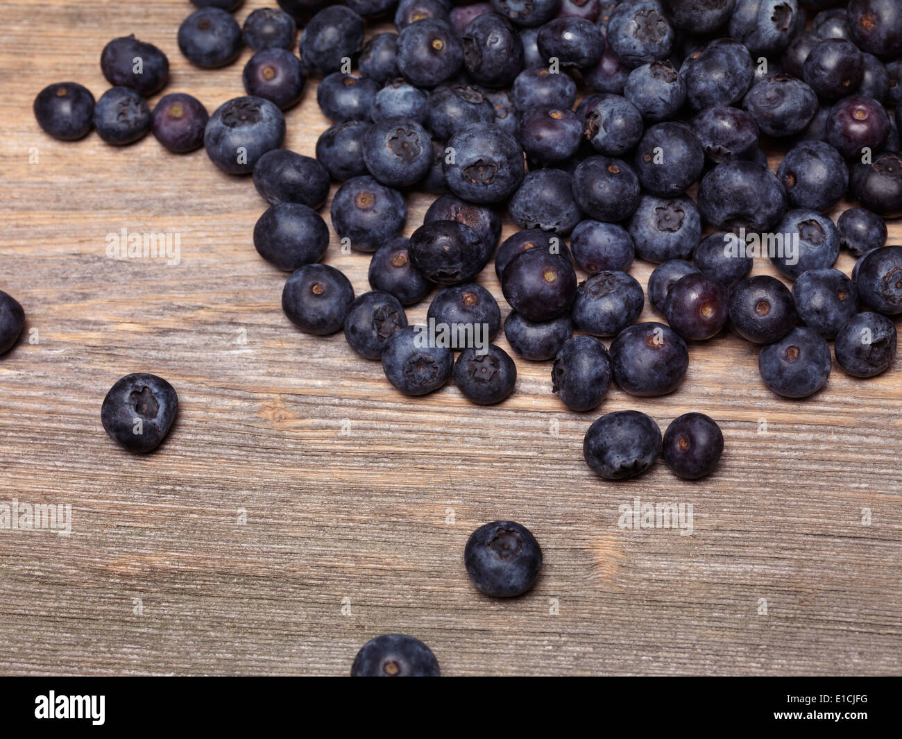 Organic blueberries on wood background Stock Photo