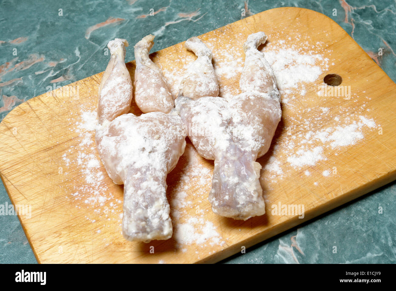 cooking two frog legs Stock Photo Alamy