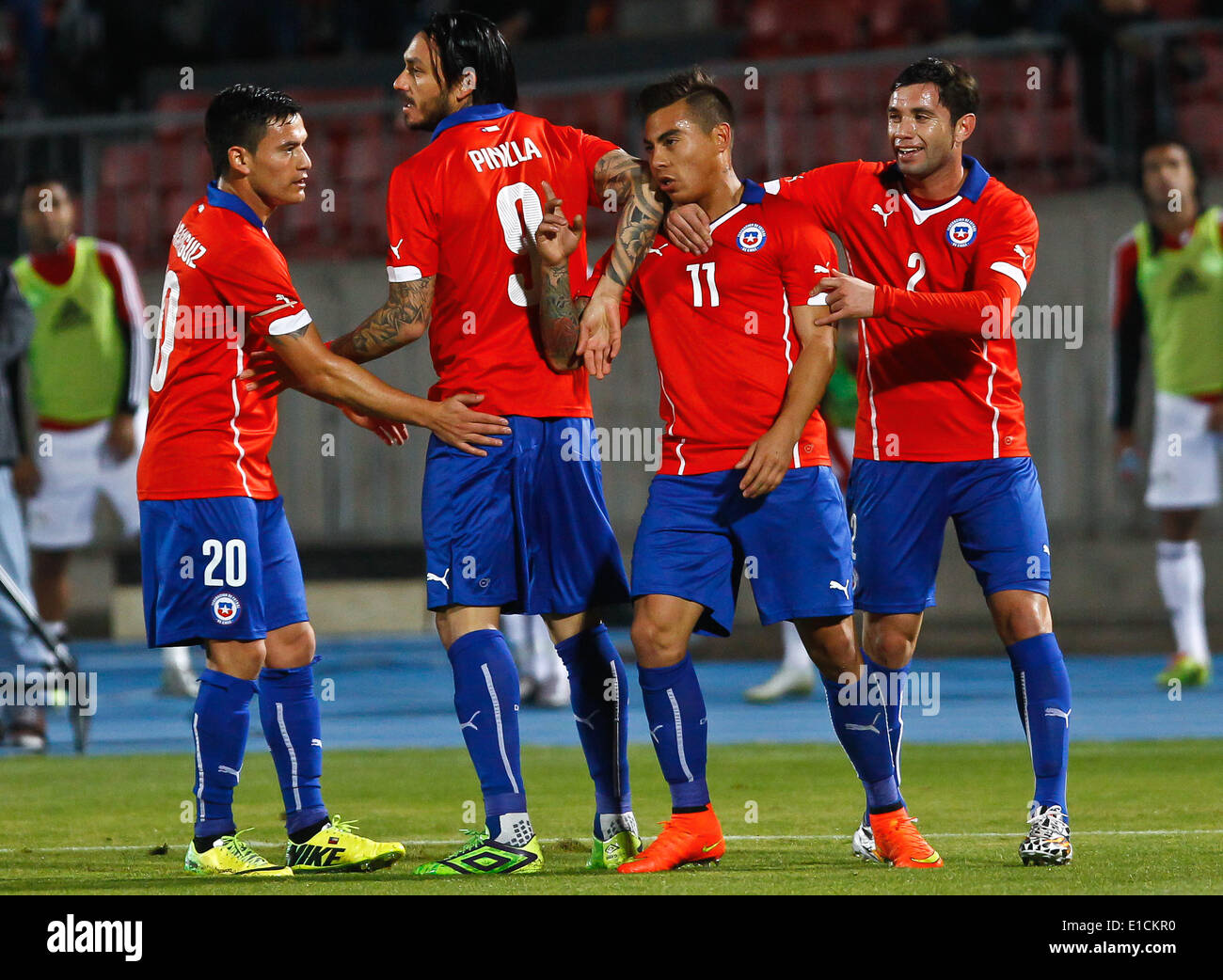 Santiago, Chile. 30th May, 2014. Eduardo Vargas (2nd R) of Chile celebrates his goal during their international friendly soccer match against Egypt in Santiago City, capital of Chile, on May 30, 2014. © Stringer/Xinhua/Alamy Live News Stock Photo