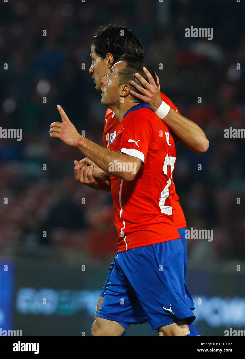 Santiago, Chile. 30th May, 2014. Marcelo Diaz (front) of Chile celebrates his goal during their international friendly soccer match against Egypt in Santiago City, capital of Chile, on May 30, 2014. © Stringer/Xinhua/Alamy Live News Stock Photo
