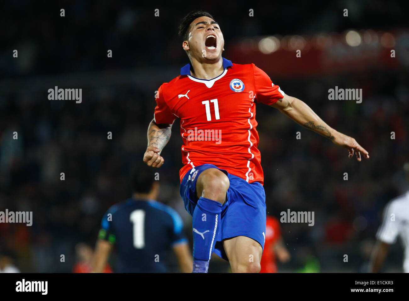Santiago, Chile. 30th May, 2014. Eduardo Vargas of Chile celebrates his goal during the international friendly soccer match against Eygpt in Santiago City, capital of Chile, on May 30, 2014. © Stringer/Xinhua/Alamy Live News Stock Photo