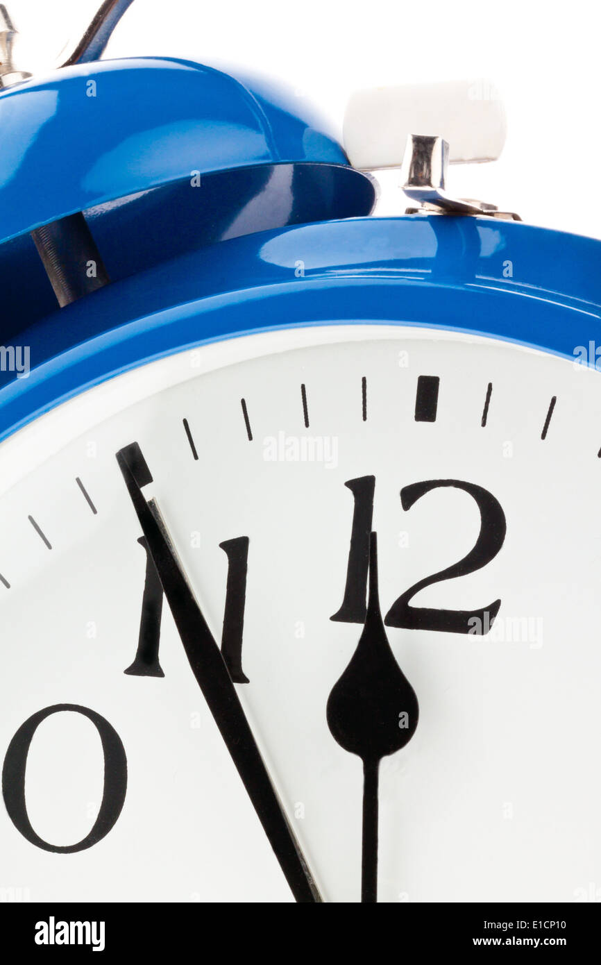five minutes to twelve on a clock. Time for decisions Stock Photo