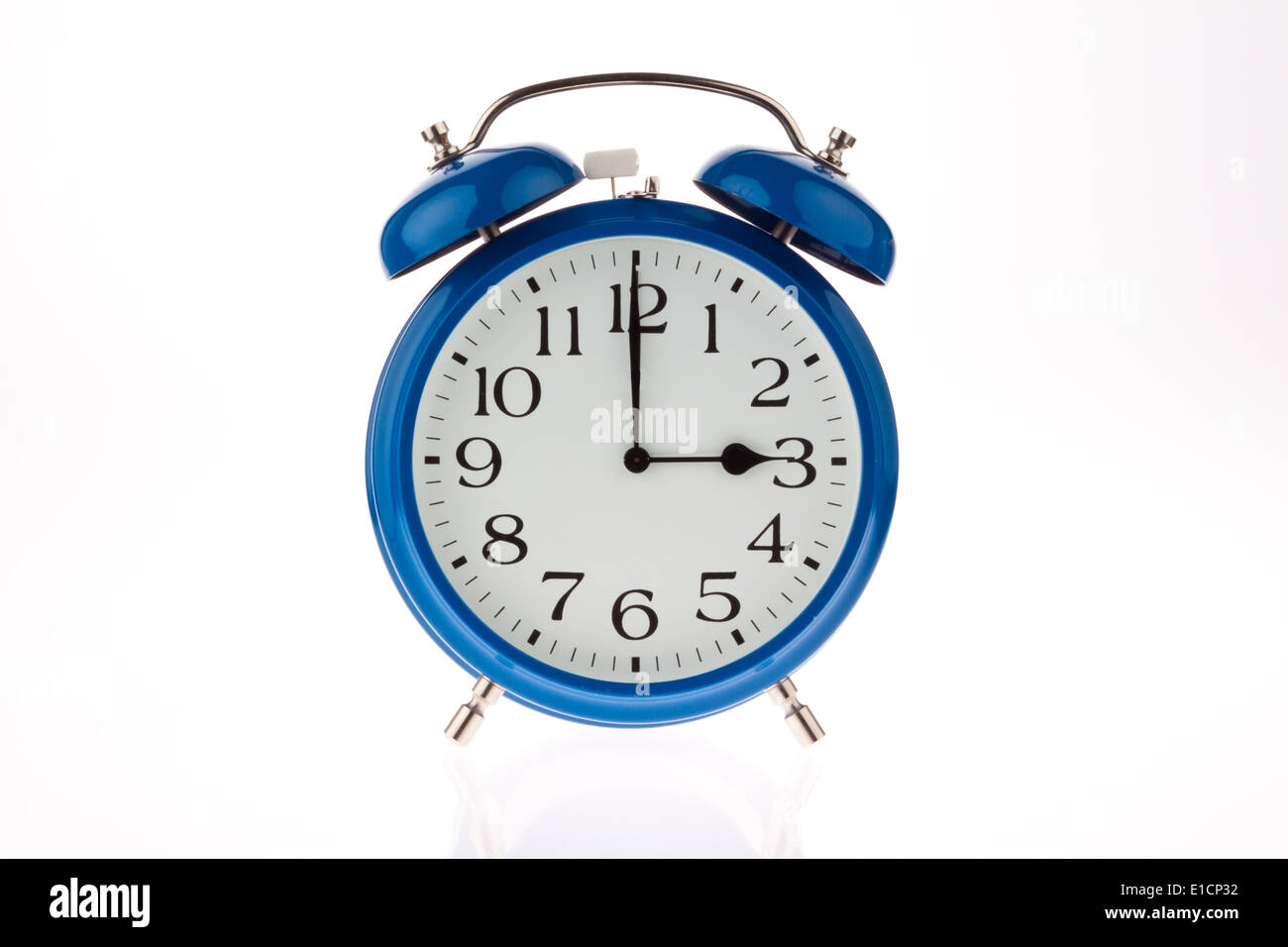 Alarm clock as a symbol of time change from summer to winter time Stock Photo