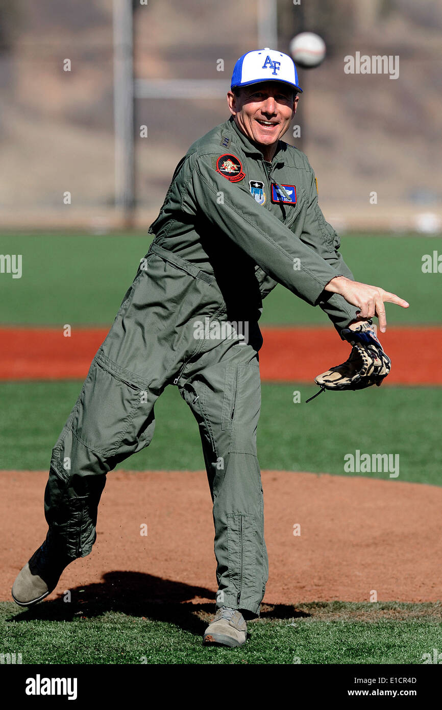 U.S. Air Force Lt. Gen. Mike Gould, the Air Force Academy?s superintendent, throws out the first pitch after the dedication for Stock Photo