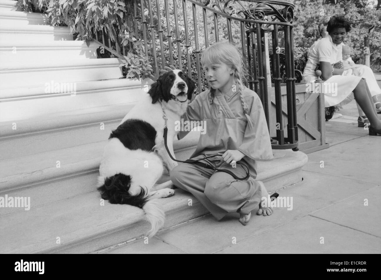 First daughter Amy Carter with her dog, Grits. The dog was a gift from her teacher. Ca. 1978. Stock Photo