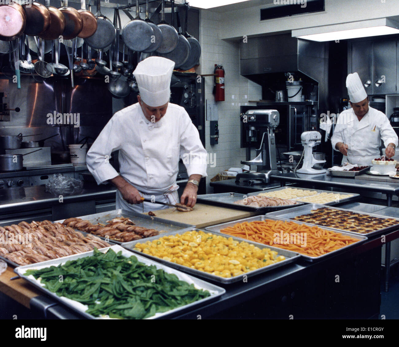 Chef Hans Raffert and Chef Roland Mesnier Prepare the State Dinner for President and Mrs. Aylwin of Chile, 05/13/1992 Stock Photo
