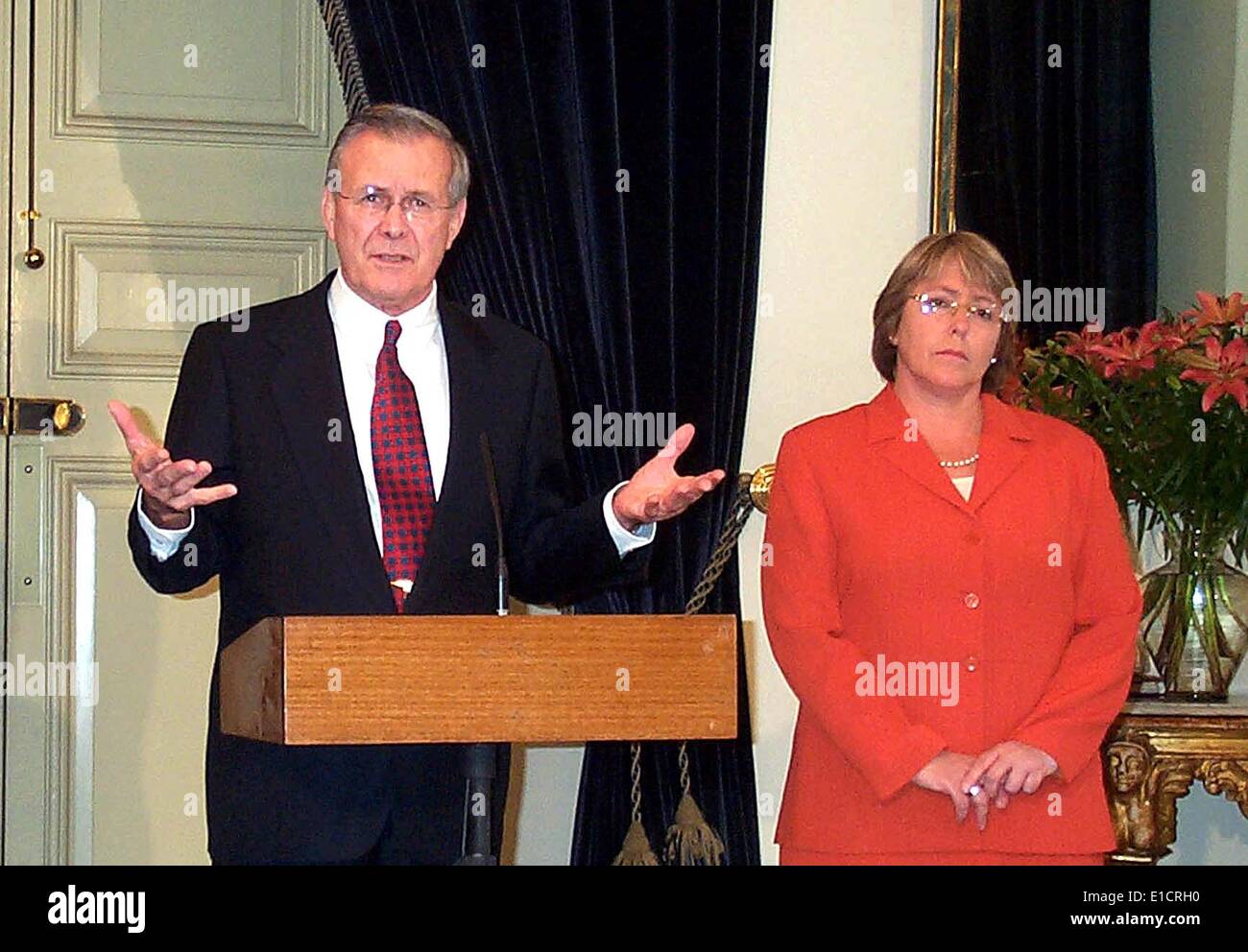 Defense Secretary Donald H. Rumsfeld and Chilean Defense Minister Michelle Bachelet, Santiago, Chile. Nov. 18, 2002. Stock Photo