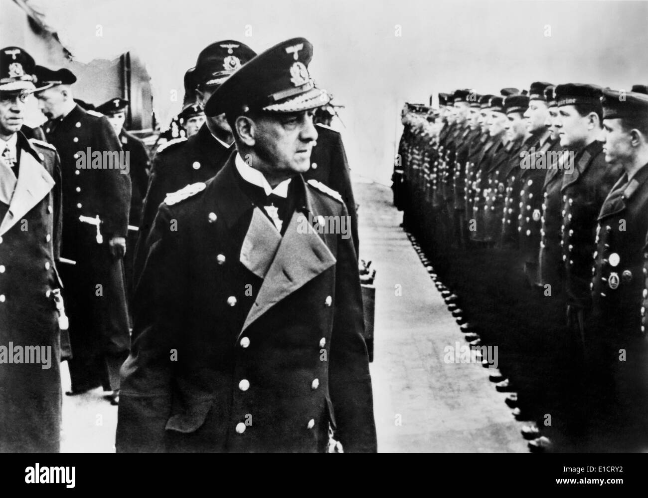German Admiral Erich Raeder visiting the crew of the battle cruiser SCHARNHORST. April 1942, after their escape from Brest Stock Photo