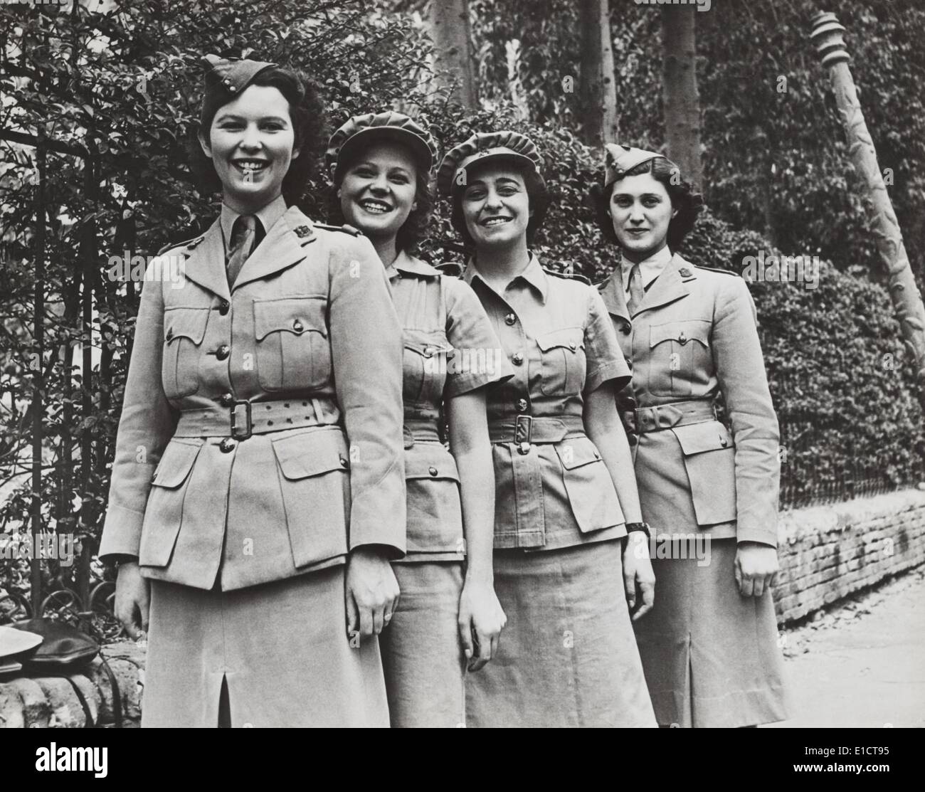 Uniformed women of the British military services during World War 2. They are members of the Cairo Amateur Dramatic and Musical Stock Photo