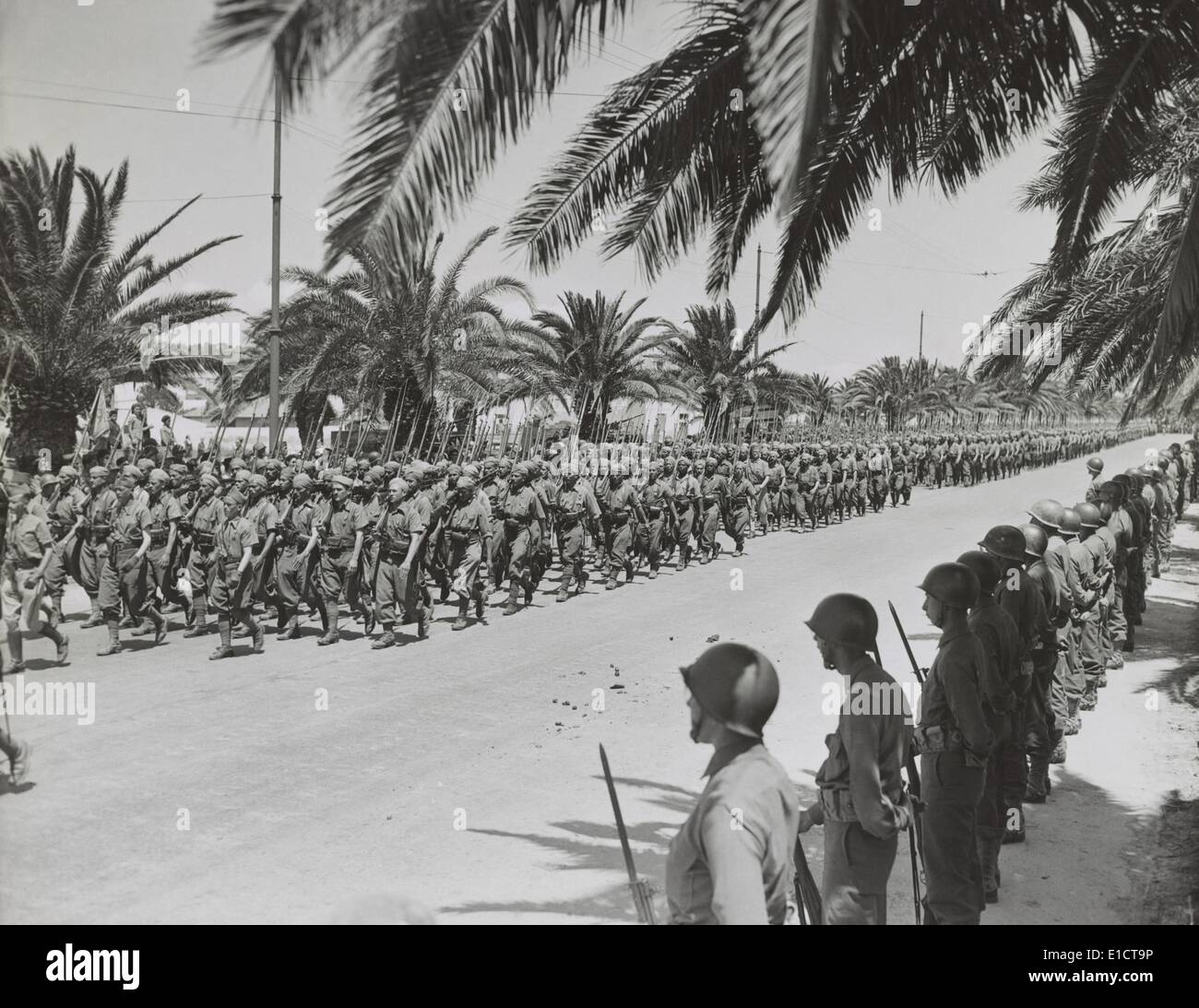 French soldiers marching in the Allied victory parade along Avenue
