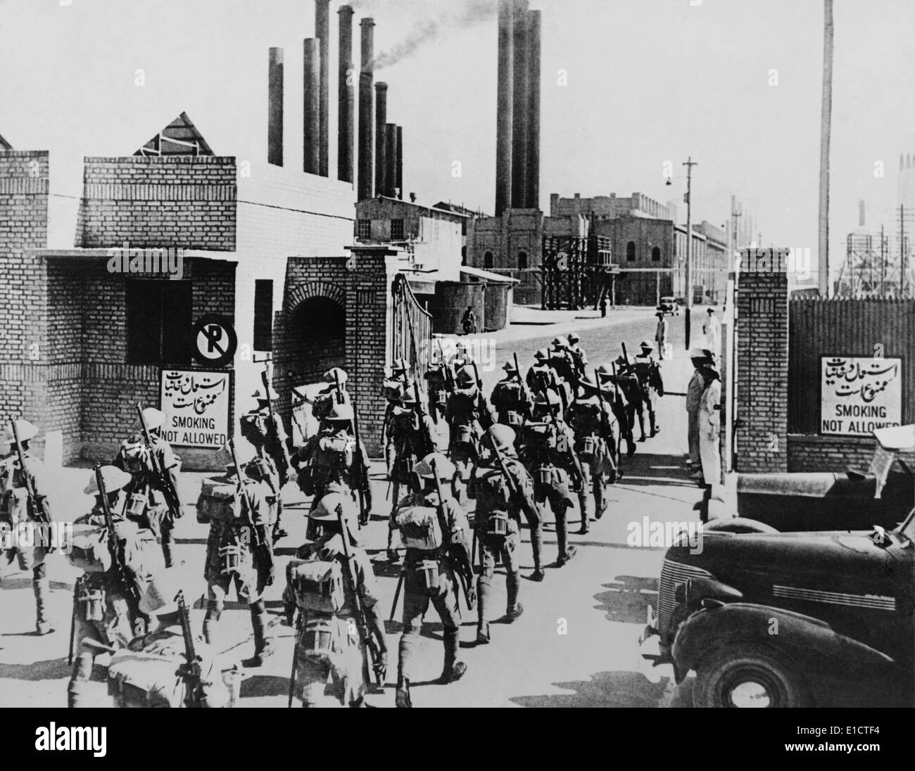 Indian soldiers enter the world's largest oil refinery on Abadan Island, Iran. They overcame defending Iranian forces during Stock Photo