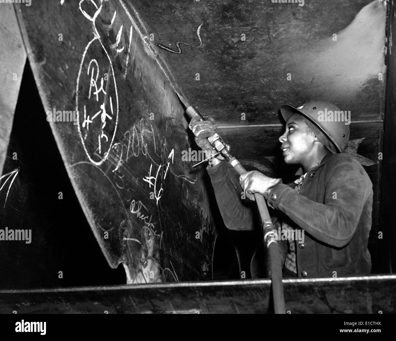 African American woman working on the Liberty Ship, SS George Washington Carver. Eastine Cowner, works as a scaler at the Stock Photo