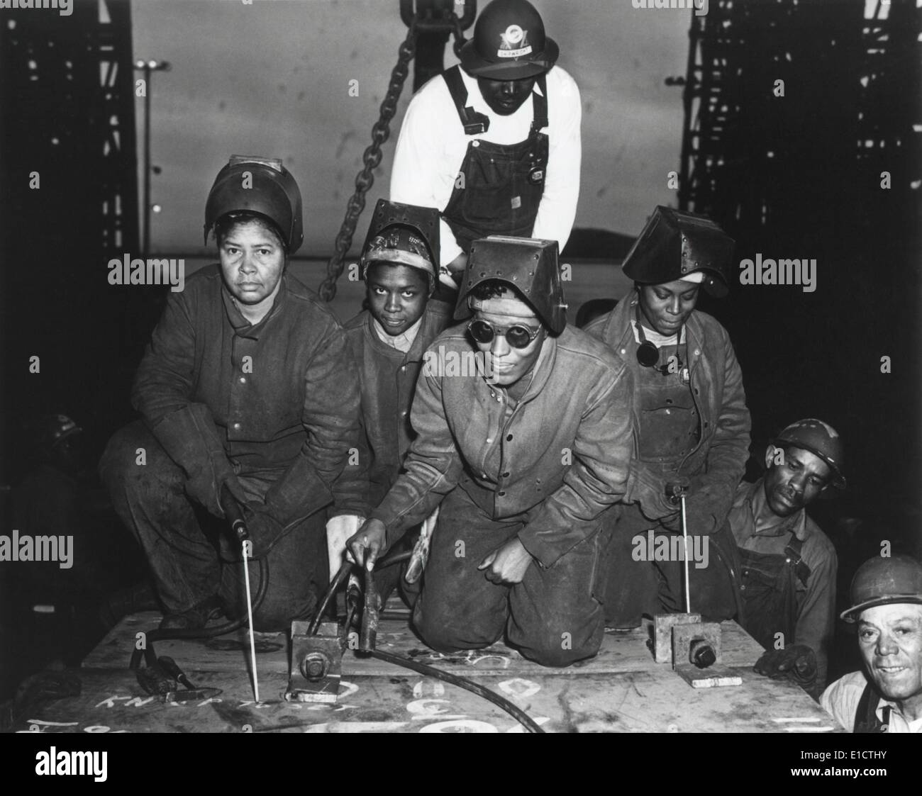 African American woman welders working on the Liberty Ship, SS George Washington Carver. Kaiser shipyards, Richmond, Stock Photo