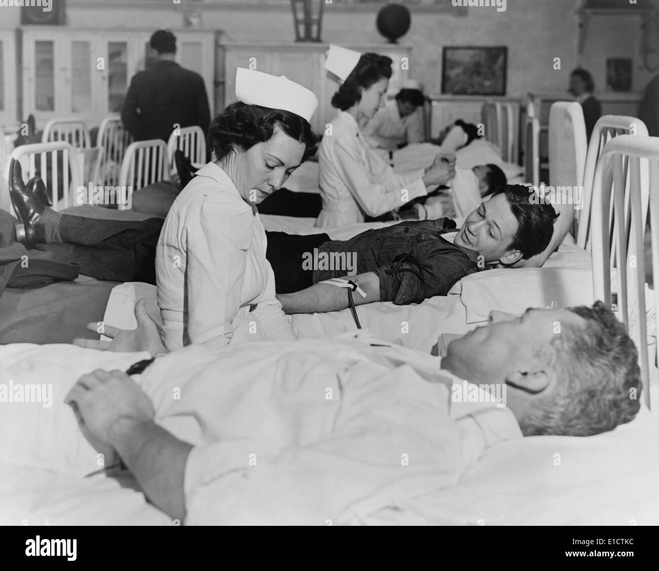 San Quentin prisoners contribute their blood to the Red Cross during World War 2. Ca. 1943