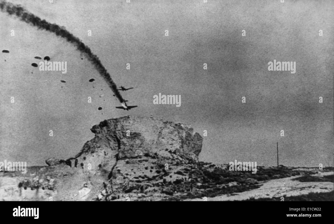 Burning German glider plane about to crash during the Nazi airborne invasion of Crete. World War 2, May 20, 1941. Stock Photo