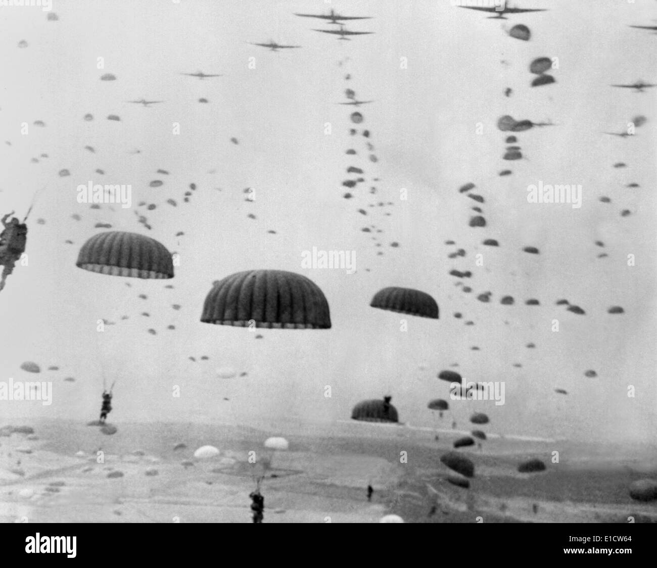 Allied aircraft drop paratroopers into German held Netherlands, for Operation Market Garden. The plan to capture key bridges in Stock Photo