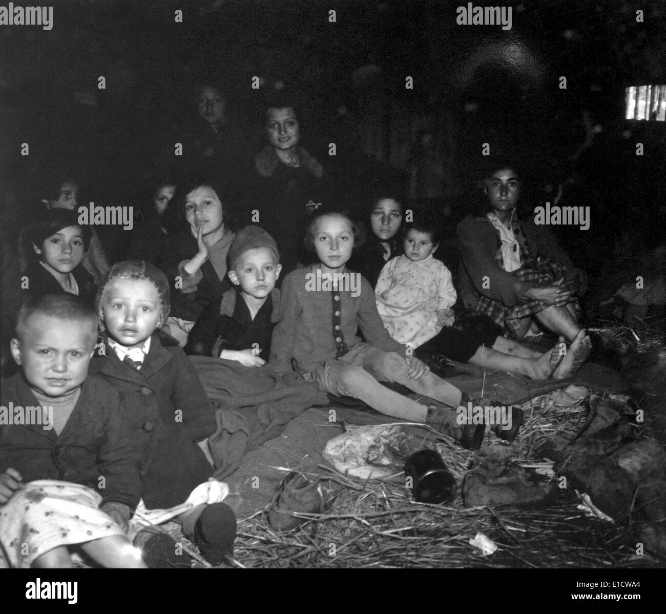 Women and children in the barracks of Gunskirchen concentration camp in Lambach, Austria. These prisoners were liberated by the Stock Photo