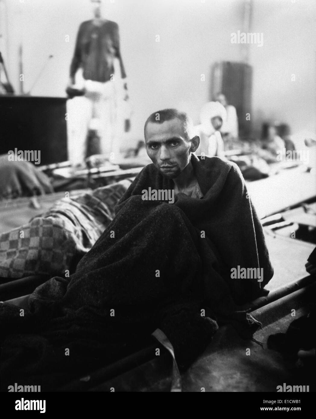 Starving inmate of Gusen concentration camp in Austria after liberation. The Mauthausen-Gusen concentration camp complex was Stock Photo