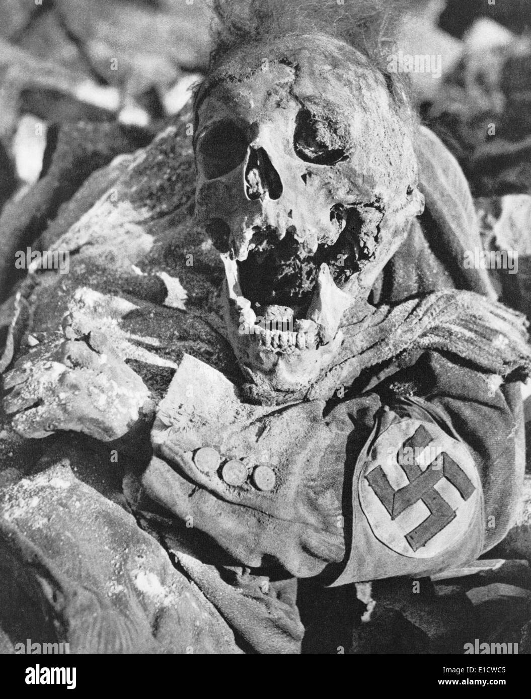 Decomposing corpse of man with swastika arm band in Dresden, Germany. Photo by Richard Peter was taken months the Allied World Stock Photo