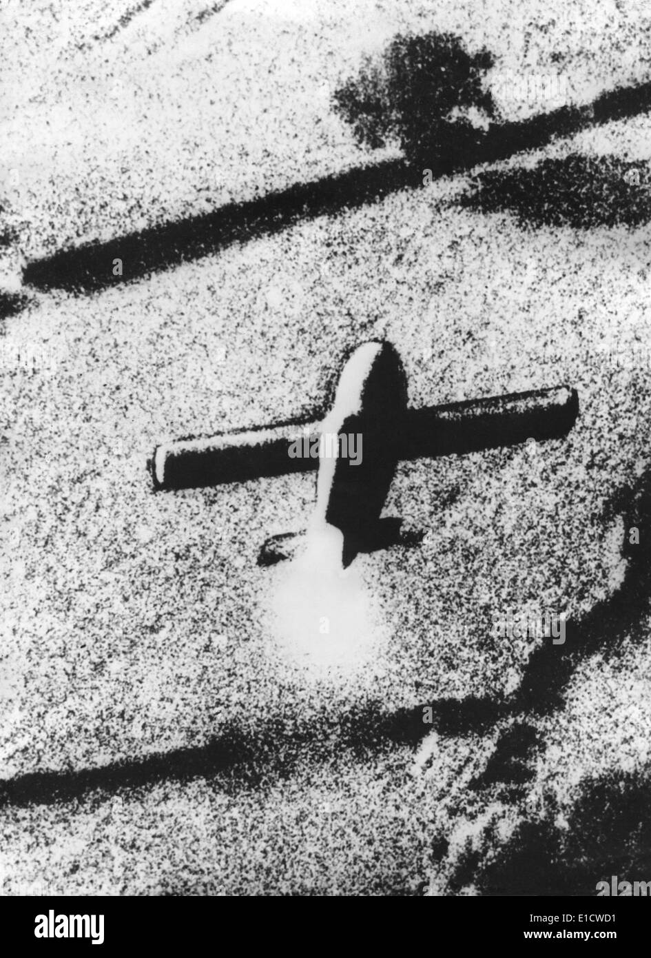 German V1 (Buzz Bomb) flying over English countryside on July 4, 1944. Photo taken by a U.S. 8th Air Force reconnaissance plane Stock Photo