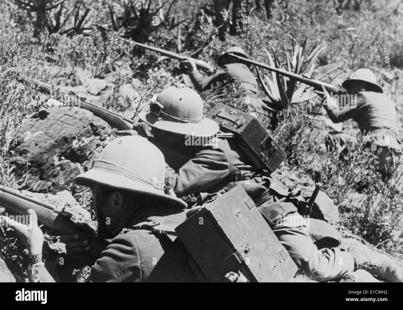 Four Italian soldiers taking aim in Ethiopia in 1935. Italo-Ethiopian War, 1935-36. (BSLOC 2014 7 35) Stock Photo