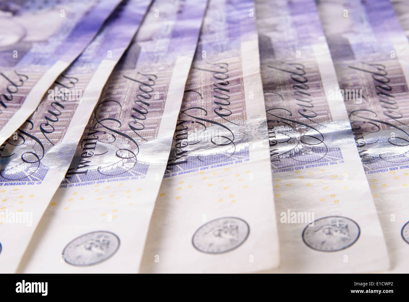 Spread of twenty British Pound notes Stock Photo