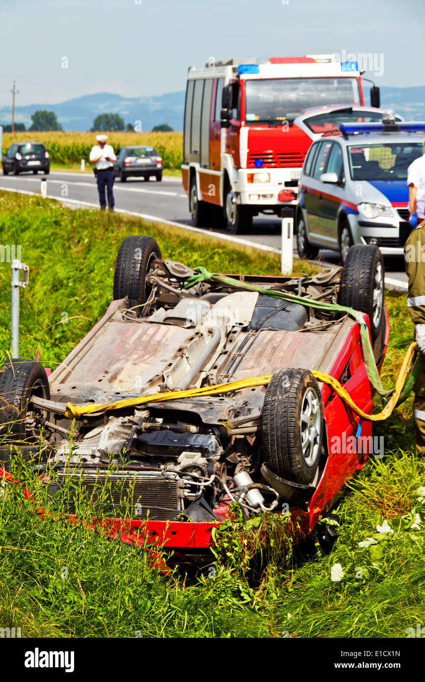 Car accident with police and firefighters on scene of accident. Traffic ...