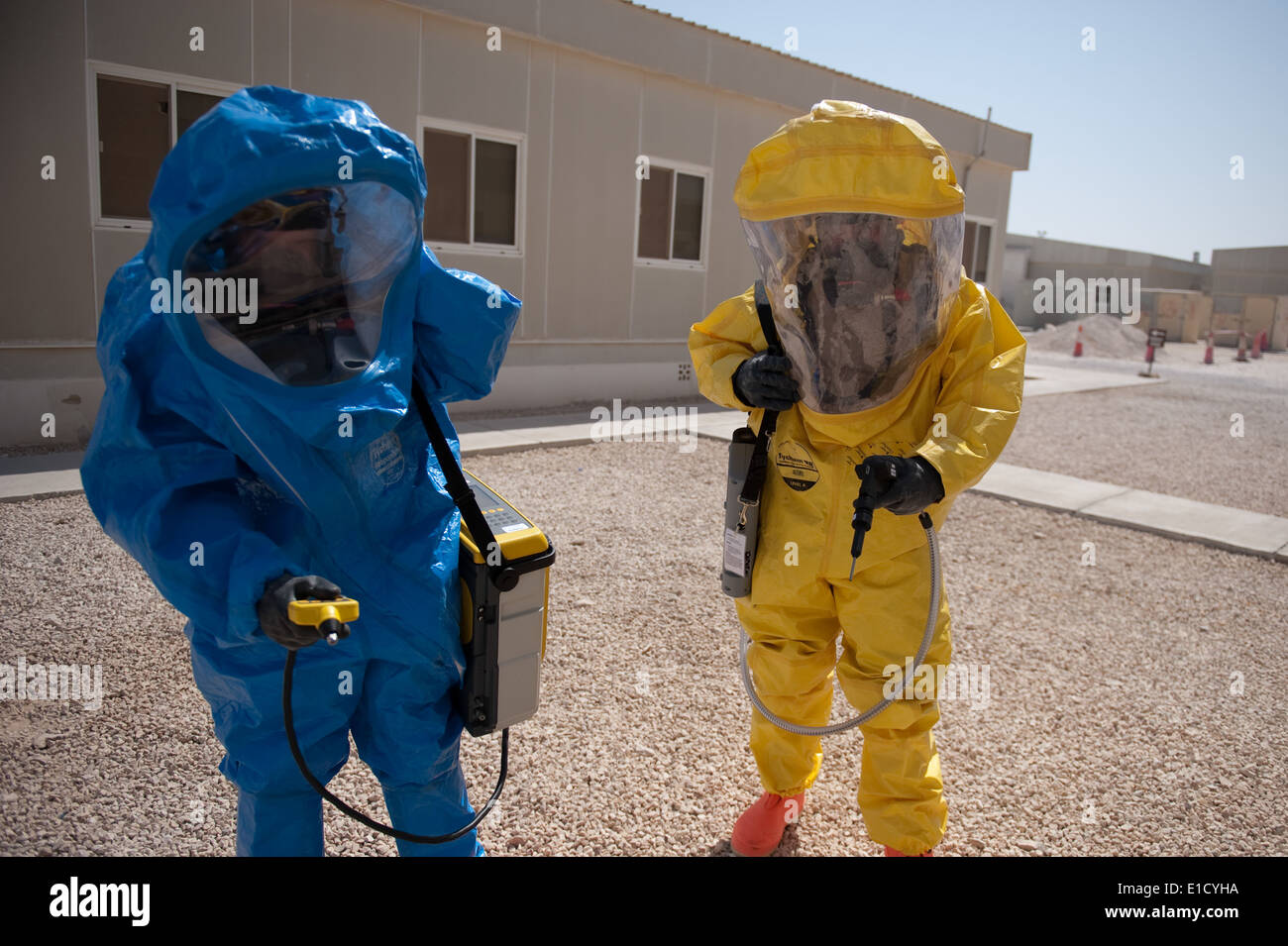 U.S. Air Force Tech. Sgt. Jeremy Roberts, left, and Senior Airman John Matlock, both with the Bioenvironmental Engineer Flight, Stock Photo