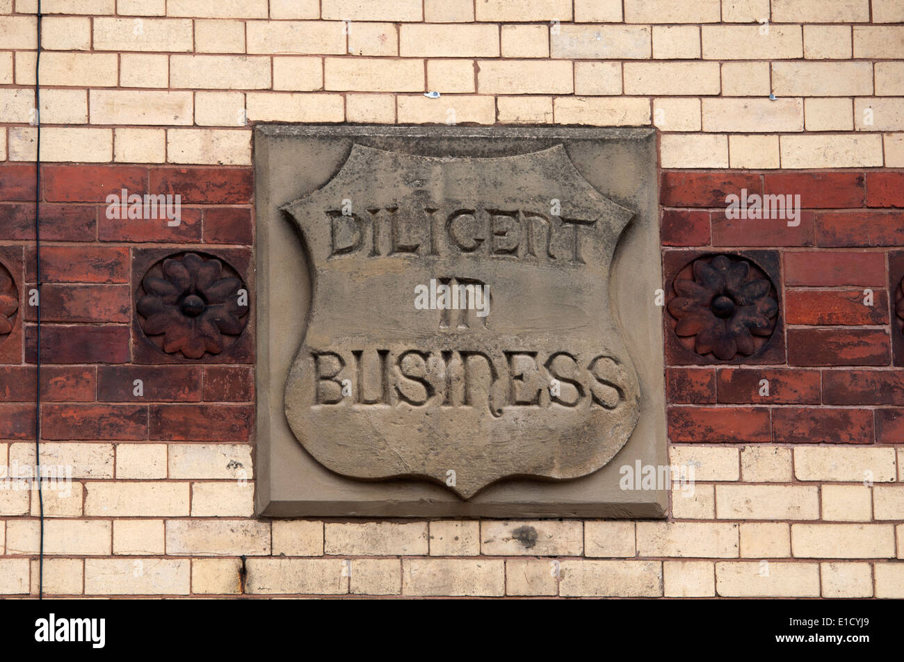 'Diligent in business' plaque, High Street, Lye, West Midlands, England, UK Stock Photo