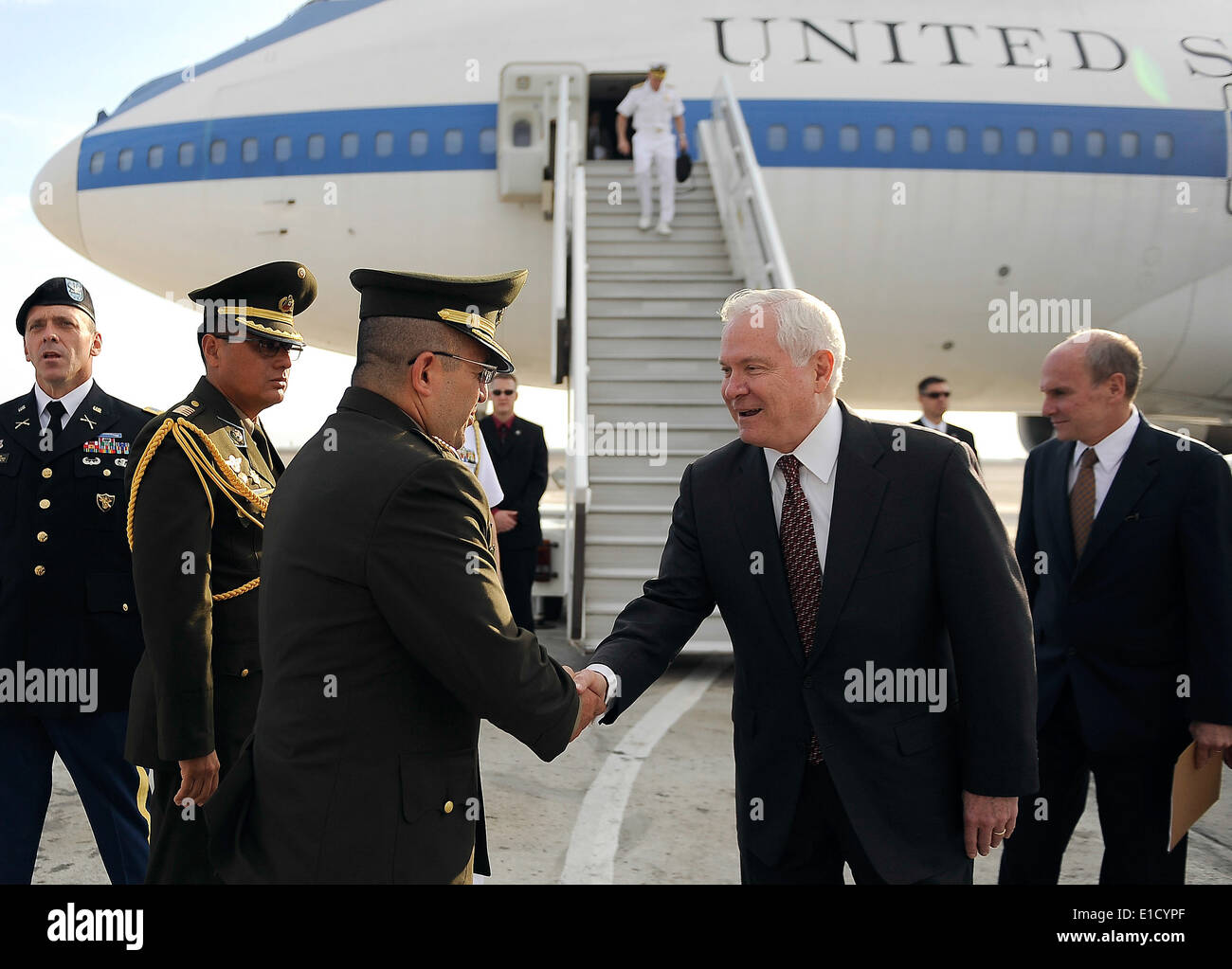 Peruvian officials greet Secretary of Defense Robert M. Gates upon his arrival in Lima, Peru, April 13, 2010. Gates is on a fou Stock Photo