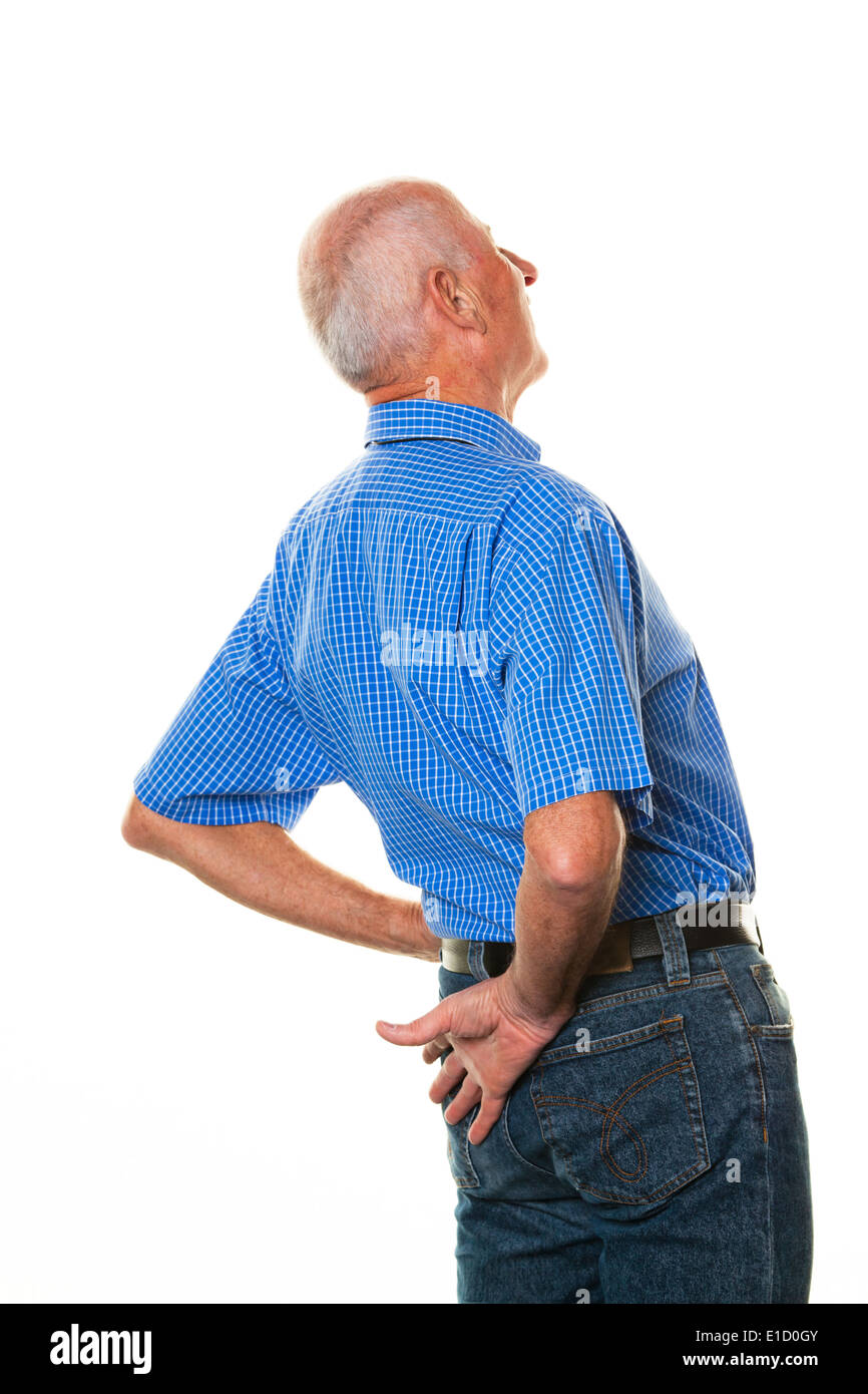 An elderly man with back pain. Senior with pain in the back. Stock Photo