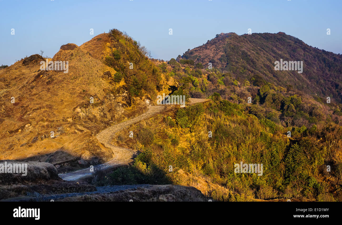 Trekking path through Himalayan mountains towards Sandakphu through ...