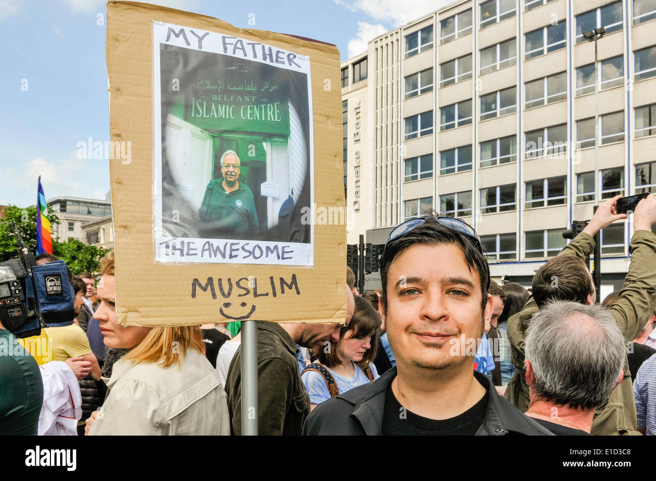 Belfast, Northern Ireland. 31 May 2014 - A man holds a sign showing a photograph of his muslim father. Thousands of people turn out for an anti-racism rally held in support of Anna Lo MLA.  Ms Lo had threatened to leave Northern Ireland because of the amount of racist attacks. Credit:  Stephen Barnes/Alamy Live News Stock Photo