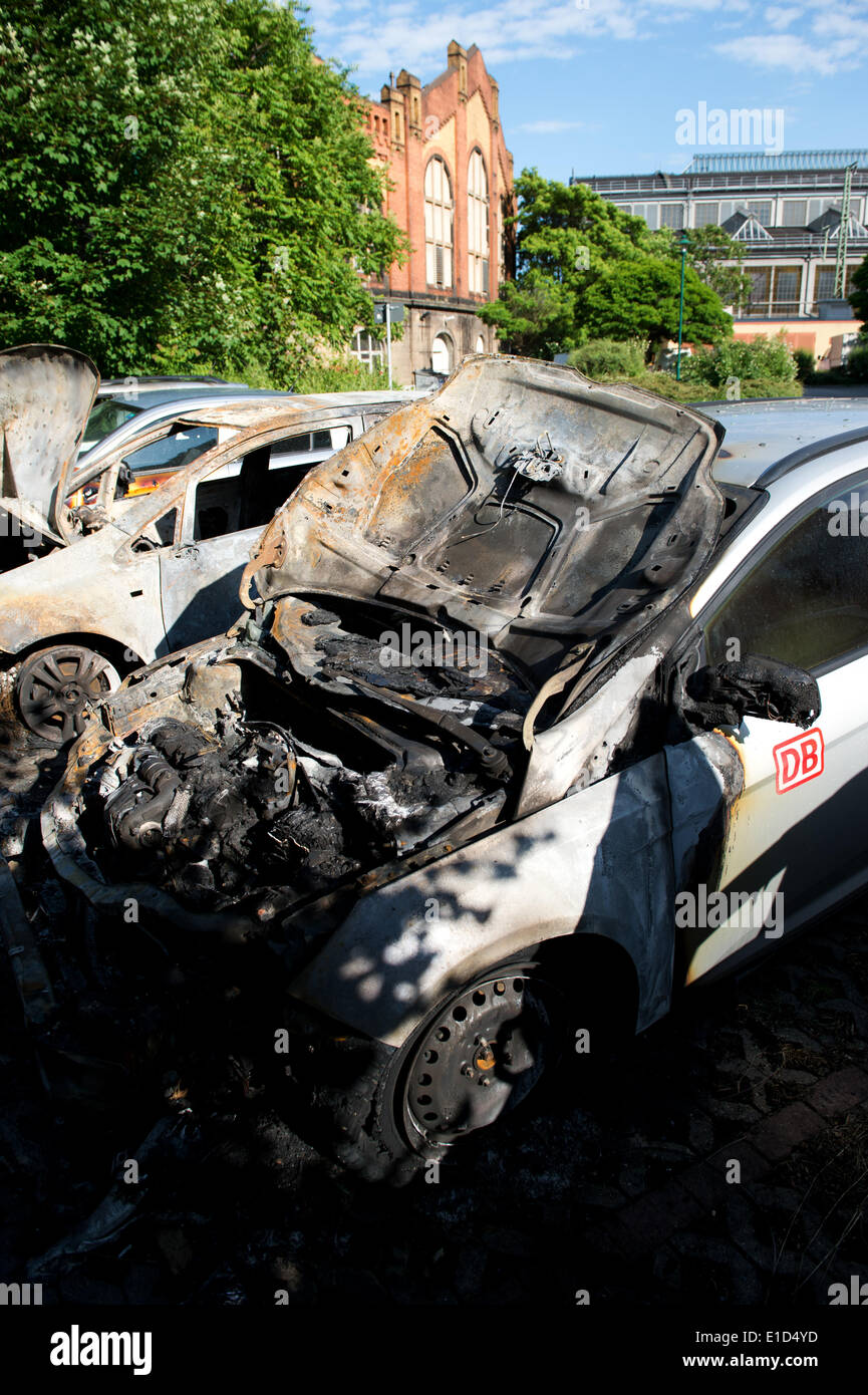 Deutsche Bahn cars are pictured after an arson attack at Neustaedter Station in Dresden, Germany, 31 May 2014. Police are still investigating after several vehichles were set on fire last night. Photo: ARNO BURGI/dpa Stock Photo