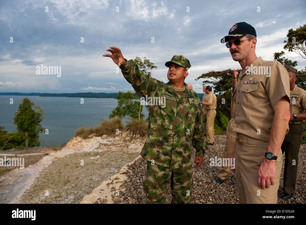 A Colombian marine, left, shows U.S. Navy Capt. Peter Brennan the barracks at Bahia Malaga Naval Base, Colombia, July 31, 2010. Stock Photo