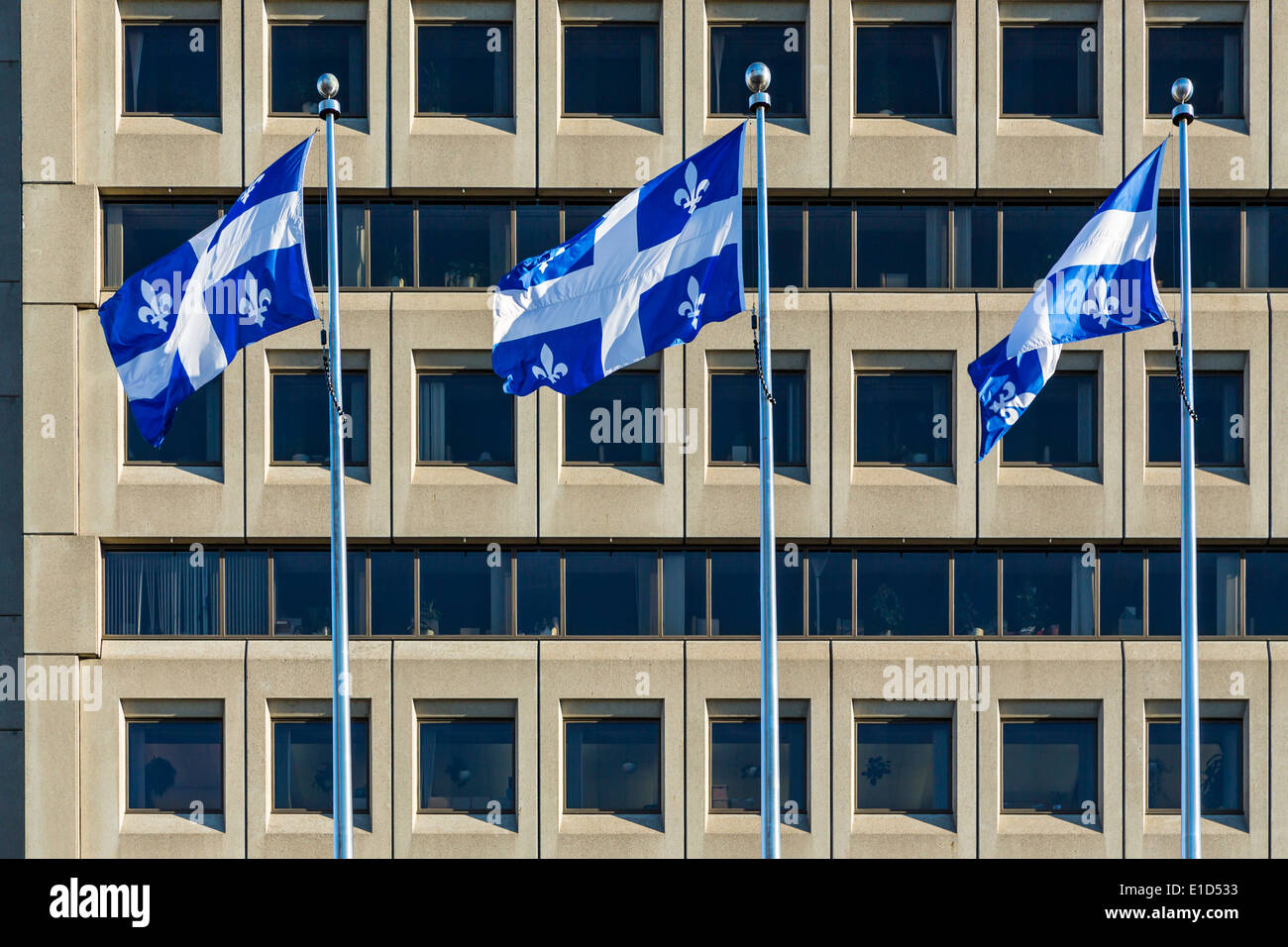 The National flag of Quebec flying in Quebec City, Quebec, Canada. Stock Photo