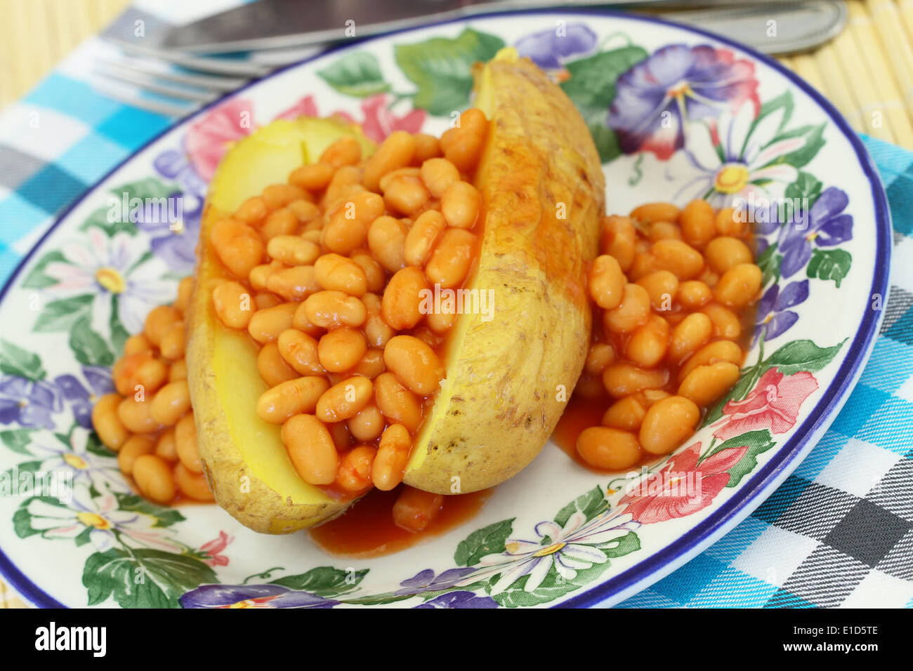 Jacket potato with baked beans Stock Photo Alamy