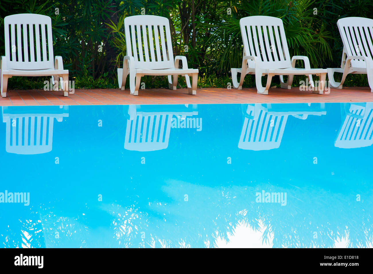 the swimming pool with some chairs Stock Photo Alamy