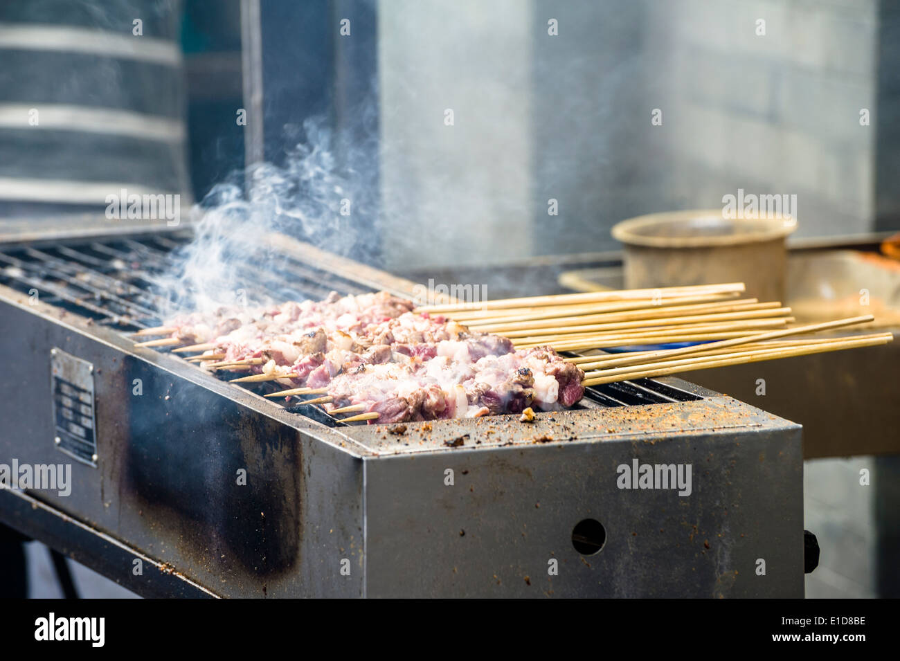Chinese popular local food: mutton cubes roasted on a skewer, which come from Xinjiang. Stock Photo