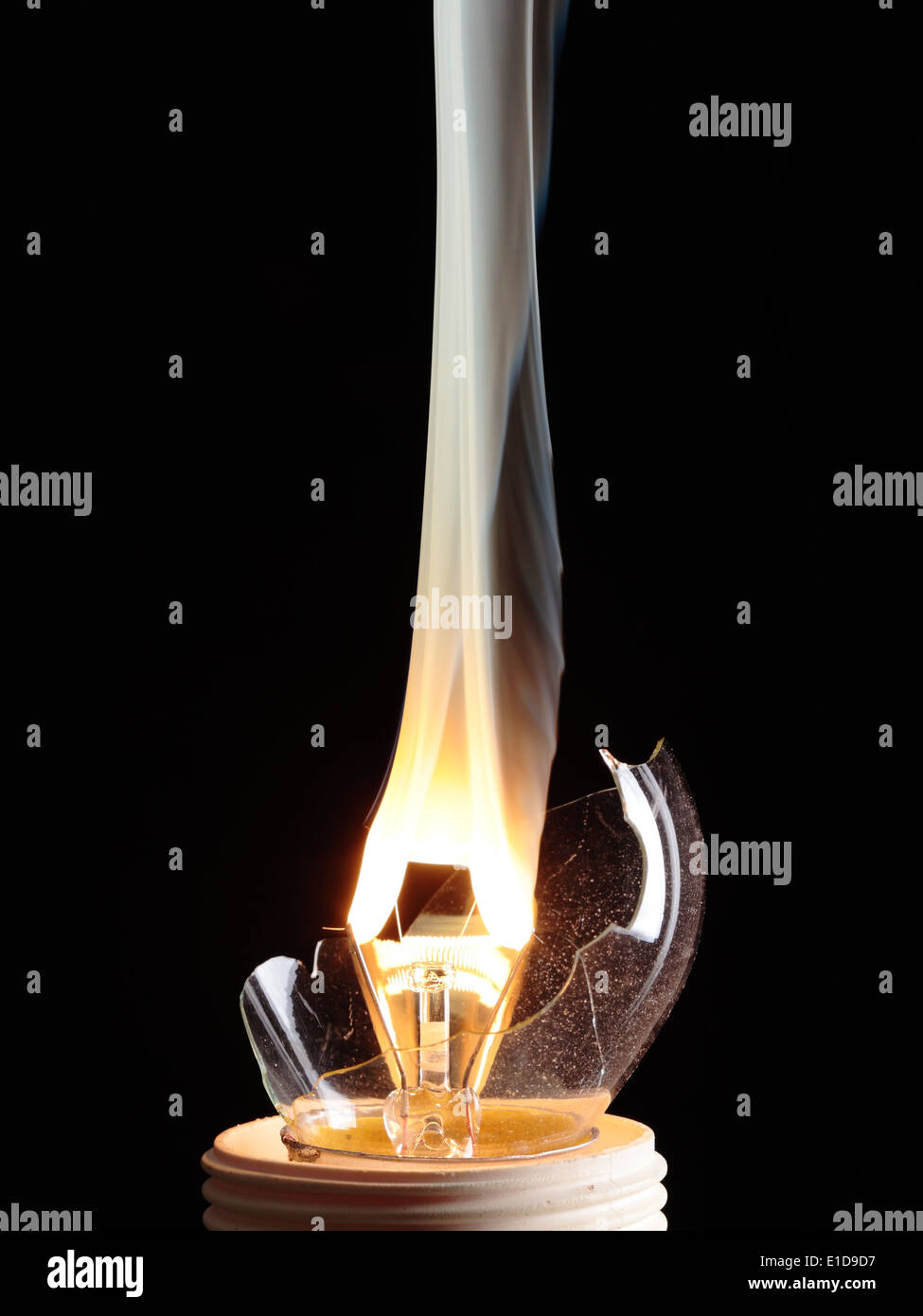 bulb exploding with fire and smoke Stock Photo Alamy