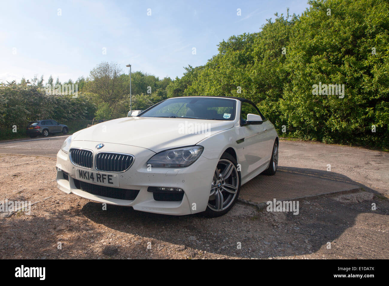 White BMW 6 Series M Sport Convertible 2 door 640d parked Stock Photo