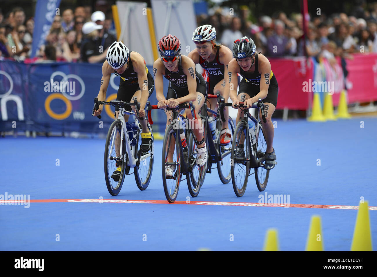 London, UK. 31st May, 2014. A small group of chase riders during the cycling component of the ITU Elite Women's Triathlon. Riders are, L to R: Anne Haug (GER), Yuko Takahashi (JPN), Chelsea Burns (USA) and Lisa Sieburger (GER). Credit:  Michael Preston/Alamy Live News Stock Photo