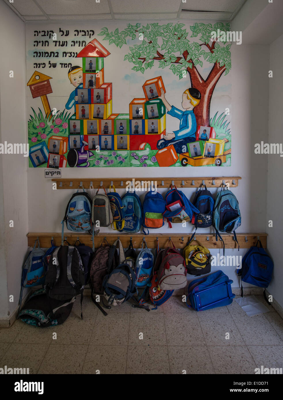 (140601) -- JERUSALEM, June 1, 2014 (Xinhua) -- Orthodox Jewish pupils' bags are seen outside a classroom of Torat Moshe elementary school in Beit Shemesh, about 20 km from Jerusalem, on May 29, 2014. Tzviel Noyman is an Israeli Ultra-Orthodox boy in a family with six children, three boys and three girls. He is ten years old this year and a grade three pupil of Torat Moshe elementary school, which is only opened to Jewish children. Tzviel has eight classes each day, including Hebrew, English, mathematics and Jewish religion, which has four classes each day including Talmud, Mishnah and Gemara. Stock Photo